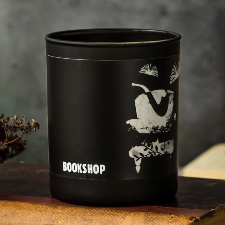 Bookshop Scented Candle: Immerse yourself in the enchanting world of books with this captivating scented candle. Experience the comforting fragrance of old books, rich mahogany shelves, and the inviting aroma, evoking the cozy ambiance of a cherished bookshop."