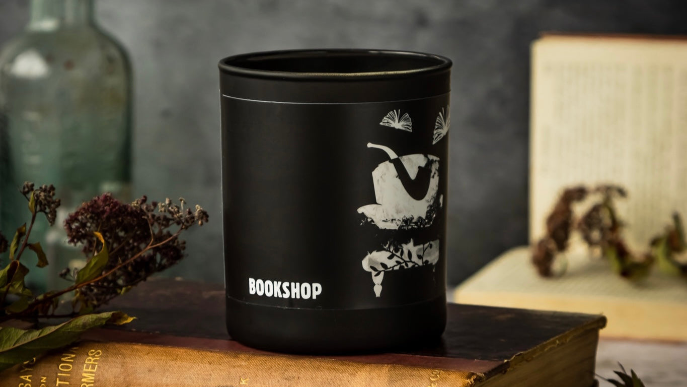 Bookshop Scented Candle: Immerse yourself in the enchanting world of books with this captivating scented candle. Experience the comforting fragrance of old books, rich mahogany shelves, and the inviting aroma, evoking the cozy ambiance of a cherished bookshop."
