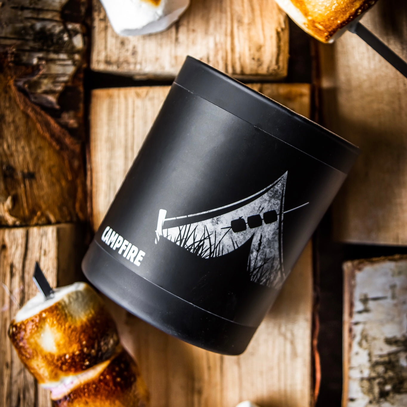 Sweet and Smokey Campfire Scented Candle: Immerse yourself in the cozy warmth of a campfire with this delightful candle. Experience the perfect balance of sweet and smoky aromas, reminiscent of toasty marshmallows, crackling wood, and a touch of caramelized sweetness.